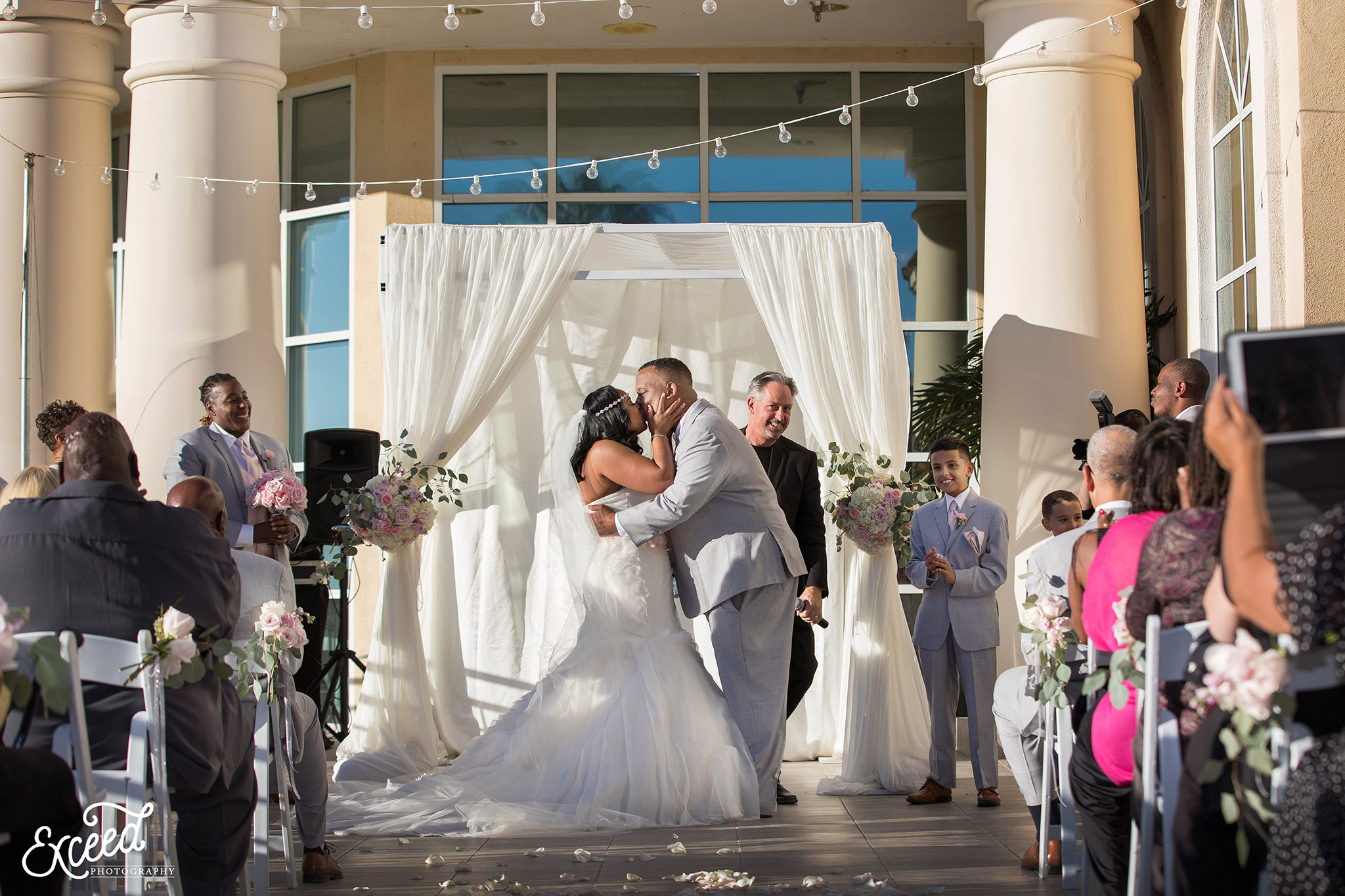 first kiss of bride and groom at Canyon Gate Country Club 
